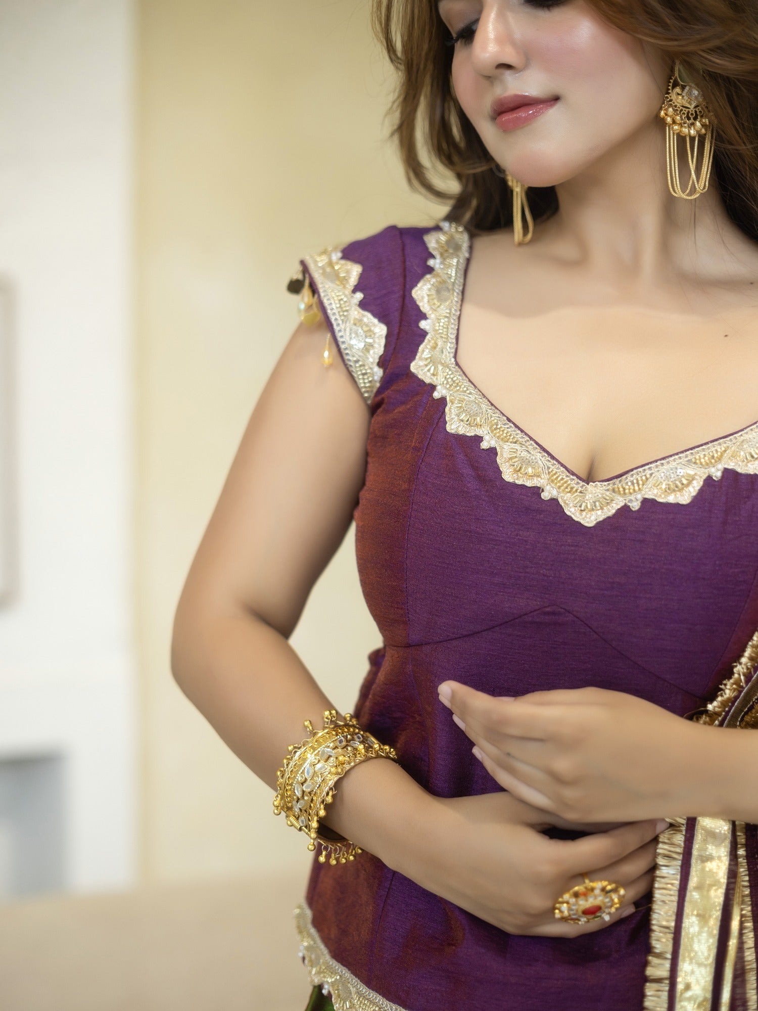 PURPLE PEPLUM BLOUSE WITH GREEN LEHENGA