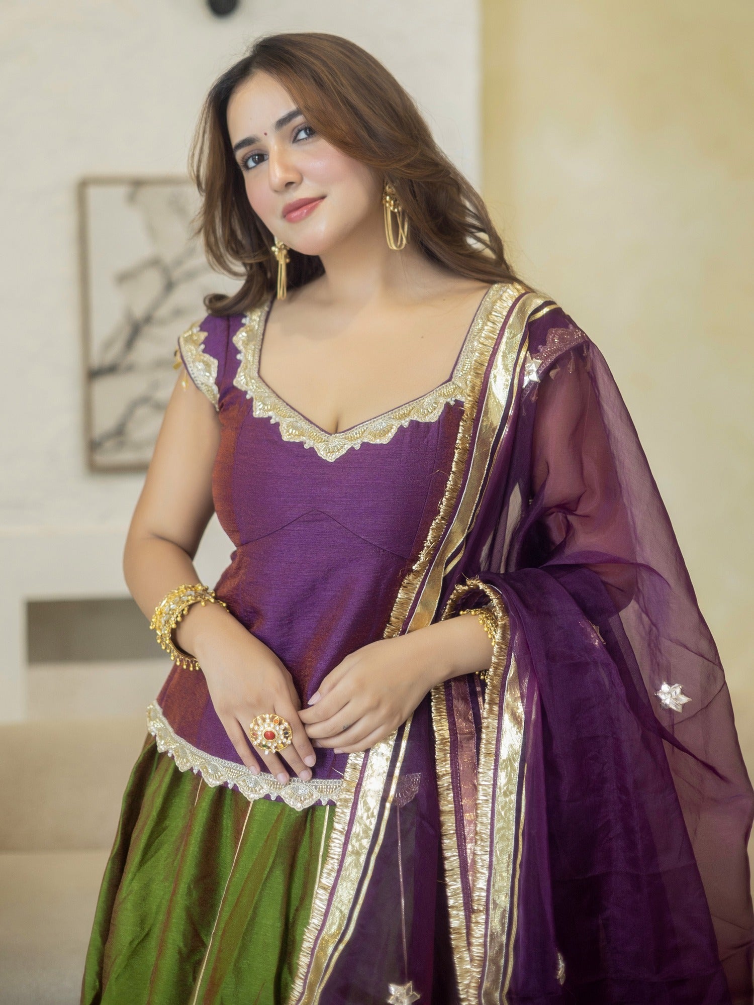 PURPLE PEPLUM BLOUSE WITH GREEN LEHENGA