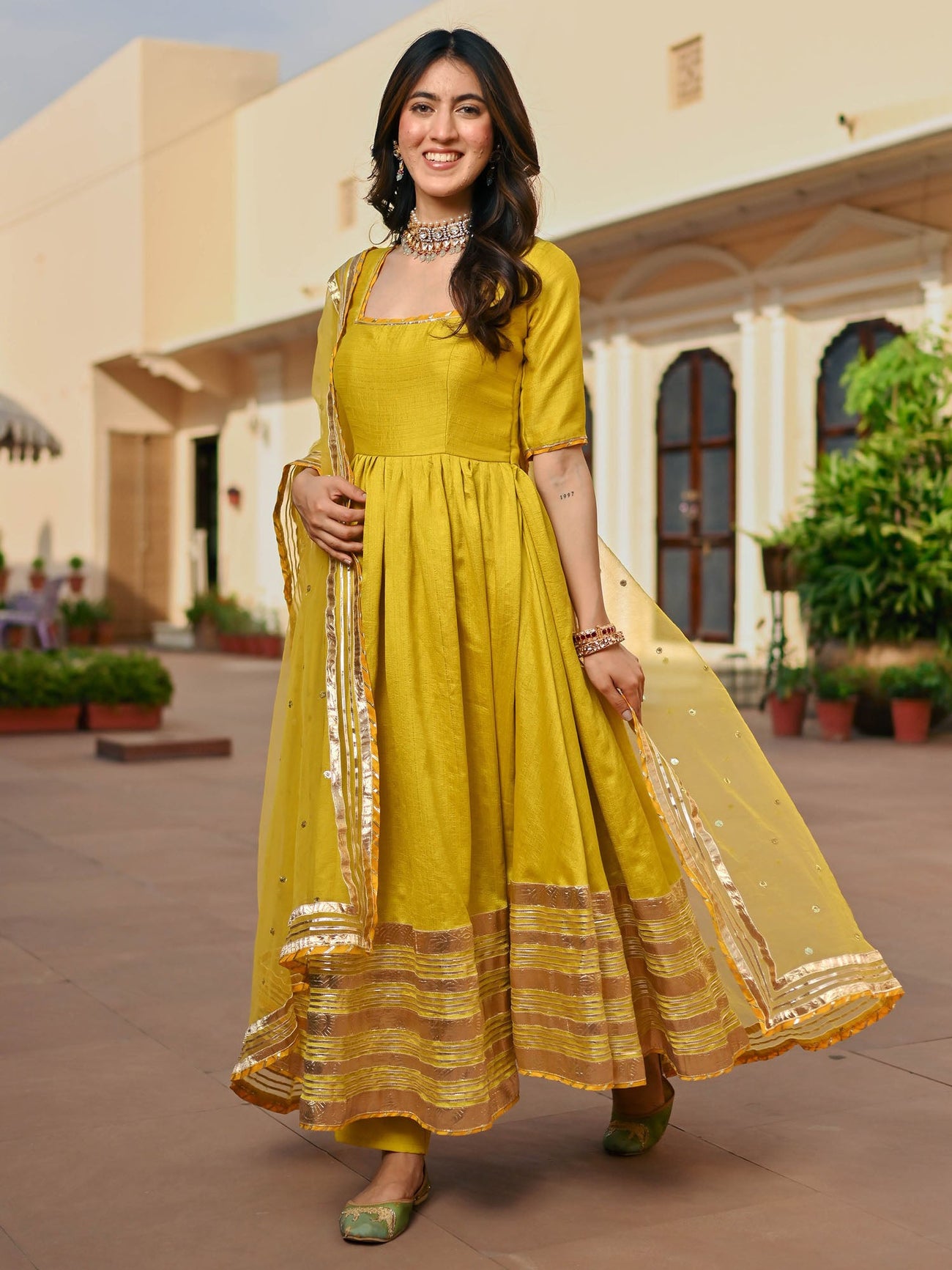 Sarasvini Green Silk Anarkali Gown Set