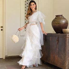 Gulaal '22 - Cameo Brown Rose Print 3 tier ruffle saree with blouse Cameo  brown rose print long cape, pleated silk skirt & silk… | Instagram